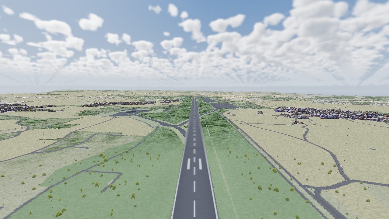 Climbing away from the runway with the town beyond